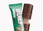 A BUILT mint chip puff shown both inside and outside of the wrapper on a white background.